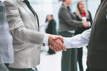 Wall Mural - close up. handshake of business people before a business meeting.