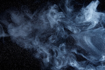 Wall Mural - Abstract white smoke moves on black background. Beautiful swirling gray smoke.