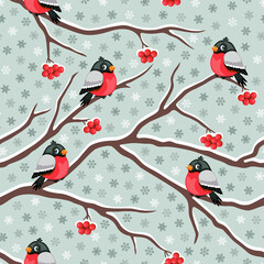 Wall Mural - Winter theme seamless pattern with bullfinches, rowan berries and snowflakes. Vector illustration.