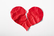 © Thawatchai - Crumpled and torn red heart shape paper isolated on white background. Broken heart concept.