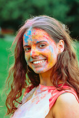 Canvas Print - caucasian woman portrait in traditional indian holi festival paints