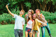 © phpetrunina14 - friends at holi fest taking selfie on the phone
