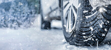 Winter Tire. Detail Of Car Tires In Winter On The Road Covered With Snow. Panorama, Banner