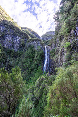 The Risco Waterfall of the island of Madeira on a sunny day