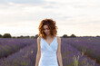 © Cavan Images - pretty woman in a lavender field