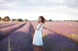 © Cavan Images - pretty woman in a lavender field
