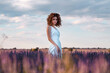 © Cavan Images - pretty woman in a lavender field