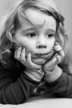Little Toddler Girl With A Chocolate Smeared Mouth