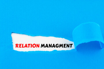 Relation Management written under torn paper