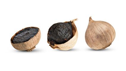 Wall Mural -  Black garlic isolated on white background.