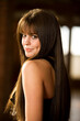 © SuperStock - Portrait of a teenage girl smiling