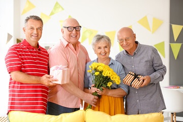 Wall Mural - Senior people celebrating Birthday at home