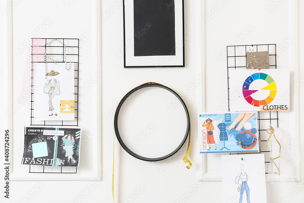 Board with sketches at fashion designer's studio