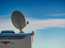 Satellite Dish On Roof Of Caravan