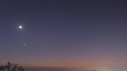 Wall Mural - time lapse in 4k video. the phenomenon of star arrangement (saturn, moon, venus, jupiter) in the mis