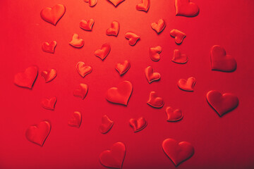 Wall Mural - Red hearts on color background