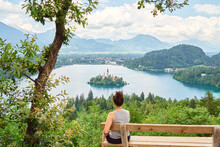 Young Girl Enjoys The Breathtaking View At Lake Bled, Slovenia.