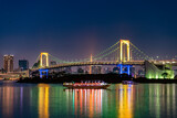 Fototapeta Koty - Rainbow bridge at twilight in Tokyo, Japan