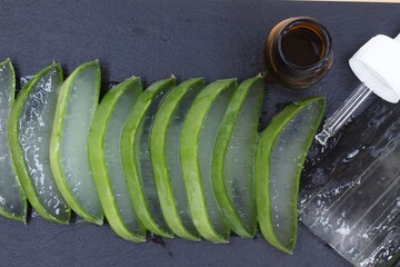 Wall Mural - Ecue Vera plant ecological sliced sliced on rose background