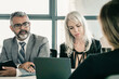 © Mangostar - Company executive and HR manager talking to job candidate at interview. Back view, closeup. Human resource and career concept