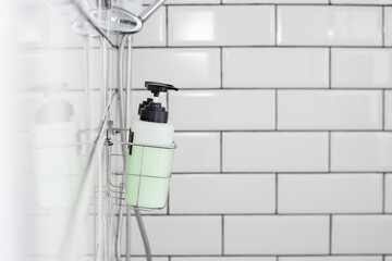 Modern hotel bathroom with Liquid soap, shampoo bottle