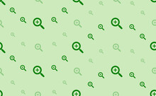 Seamless Pattern Of Large And Small Green Zoom In Symbols. The Elements Are Arranged In A Wavy. Vector Illustration On Light Green Background