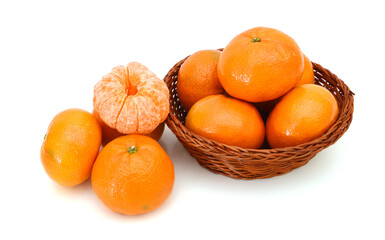 Wall Mural - orange mandarines heap in basket