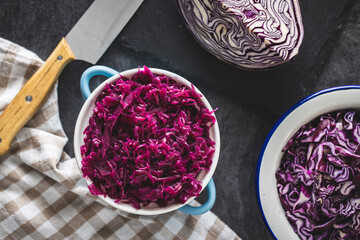 Poster - Red sauerkraut. Sour pickled cabbage in blue pot.