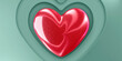 Stone glossy heart in red, on green paper with cut out hearts.