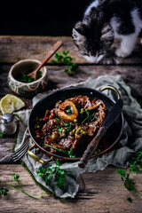 Canvas Print - Veal ossobucco with green peas.selective focus