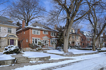 Poster - Street of traditional middle class single family houses on a sunny day in winter