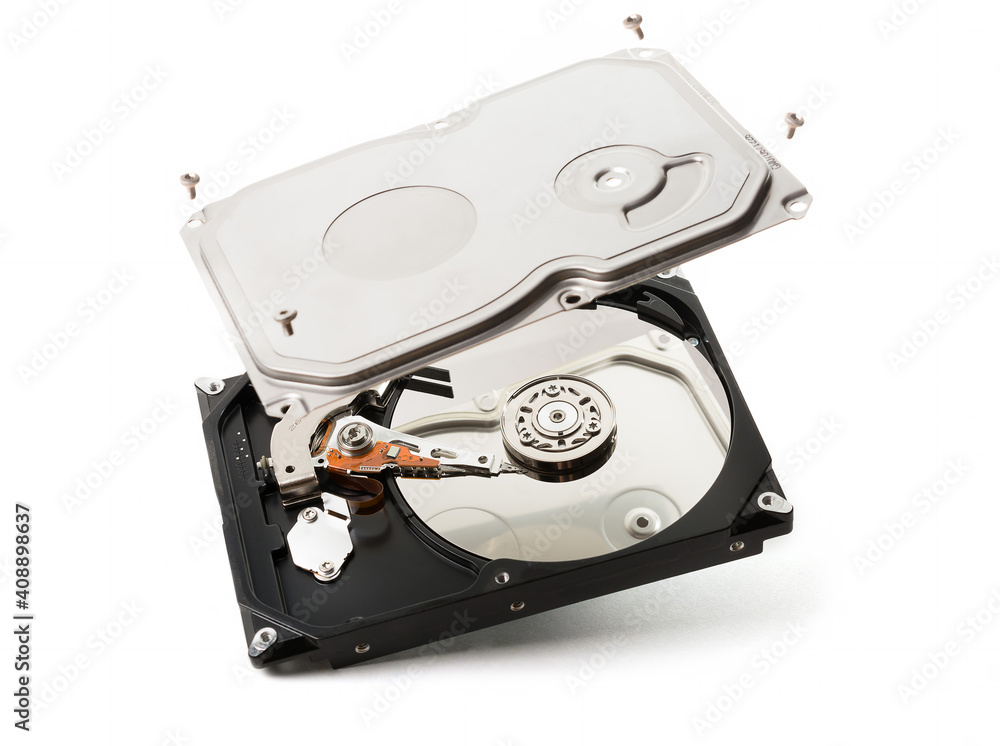 computer hard disk inside view with mirrored blank disks on which data ...