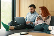 © Epic_pic - Young couple working on family business from home