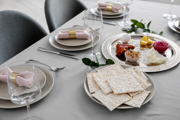 Passover Seder plate with traditional food on served table