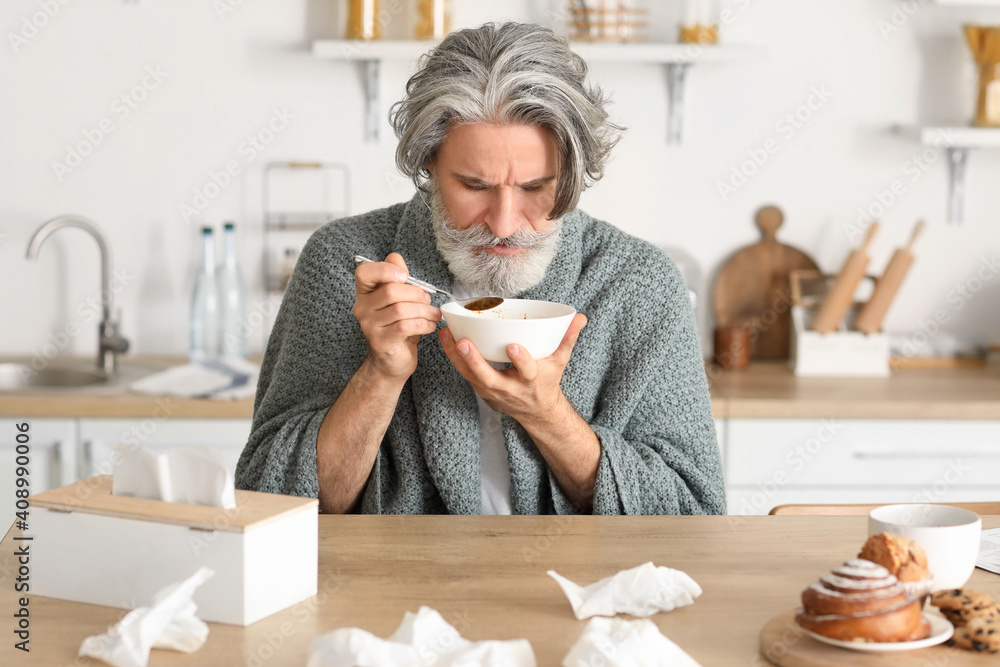 Sick mature man at home