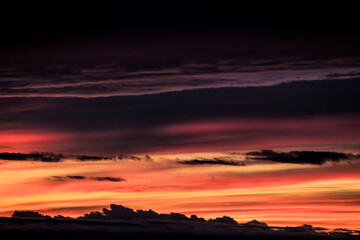 dramatic sunset sky with stormy clouds