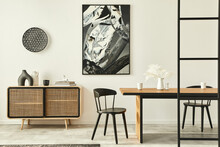 Stylish Scandinavian Living Room Interior Of Modern Apartment With Wooden Commode, Design Table, Chairs, Carpet, Abstract Paintings On The Wall And Personal Accessories In Unique Home Decor. Template.