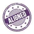 ALIGNED text written on purple indigo grungy round stamp.