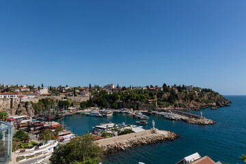 View to the city port, boats and empty blue sky