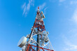 © Cavan Images - radio communication antenna on blue sky background