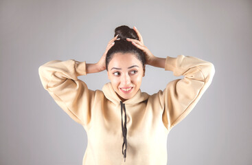 Poster - young woman collect hair