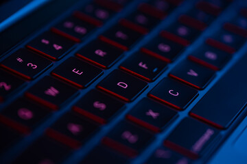 laptop keyboard neon blue and red light