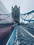 Fototapeta Londyn - Blurred Double Decker on Tower Bridge.