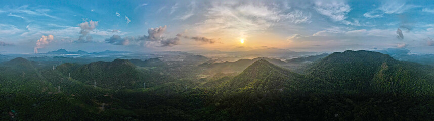 Wall Mural - Aerial view, Beautiful Panorama landscape sunrise over peak Mountain with warm light sunrise Mae Moh Lampang, Thailand