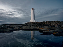 Lighthouse Against Gray Cloudy Sky