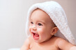 © Cavan Images - beautiful baby in his towel after a bath