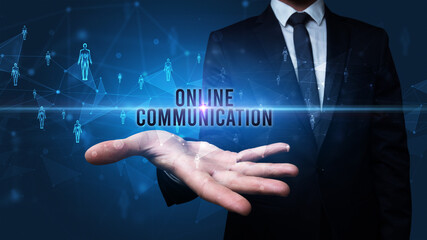 Elegant hand holding ONLINE COMMUNICATION inscription, social networking concept