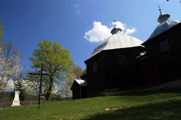 Wall Mural - Old traditional wooden church in Michniowiec village, Bieszczady Mountains, Poland