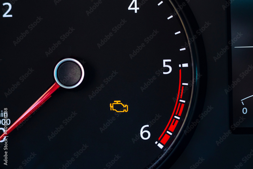 Natural light. the dashboard of the car. The engine error indicator ...