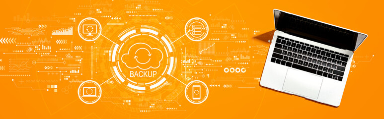 Backup concept with a laptop computer on a desk